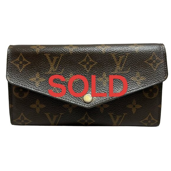 LOUIS VUITTON Portefeuille Sara Fuchsia Monogram - 257-062425 - Picture 1 of 9